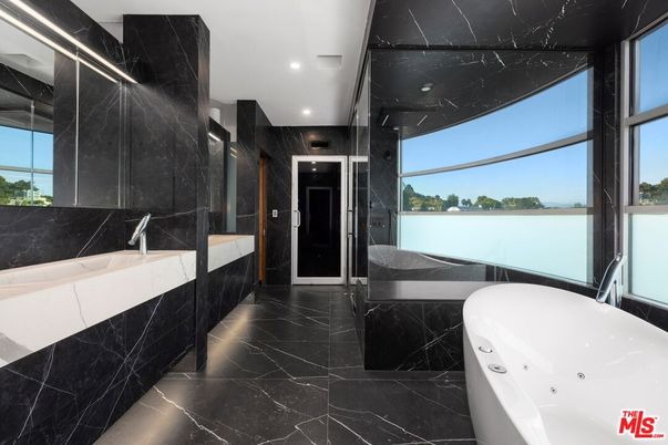 Bathroom, Dual Sink Vanities, Free Standing Baths, Glass Shower, Interior, Marble, Marble Walls, Recessed Lighting