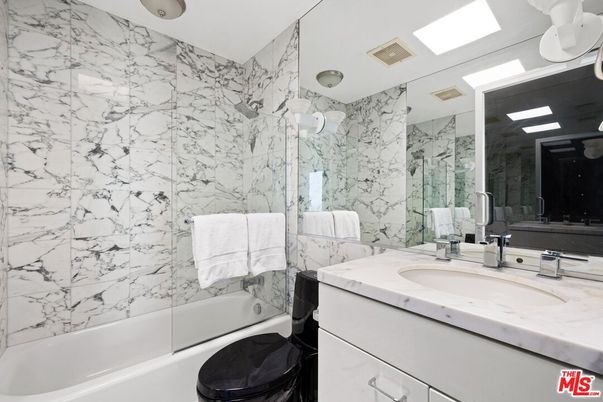 Bathroom, Dual Sink Vanities, Glass Shower, Interior, Marble Walls
