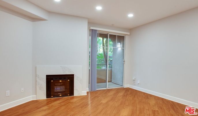 Empty room, Fireplace, Interior, Recessed Lighting, Wood Texture Flooring