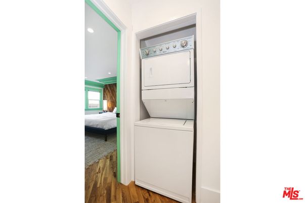 Bedroom, Interior, Recessed Lighting, Utility Closets, Washer, Wood Texture Flooring