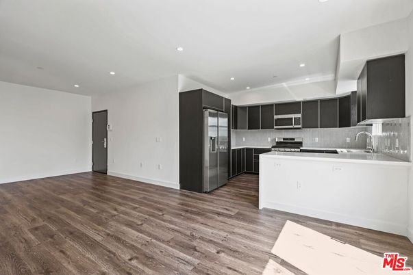 Interior, Kitchen, Recessed Lighting, Stainless Steel Appliances, Wood Texture Flooring