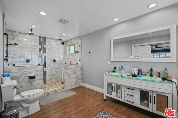 Bathroom, Glass Shower, Interior, Marble Walls, Recessed Lighting, Wood Texture Flooring