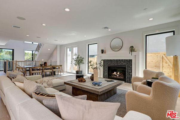 Dining room, Fireplace, Interior, Living room, Recessed Lighting, Wood Texture Flooring
