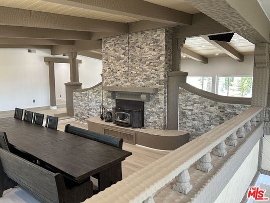 Dining room, Fireplace, Interior, Pendant Lights, Recessed Lighting, Wooden Beams, Wood Texture Flooring
