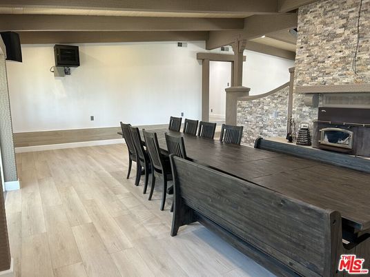 Dining room, Fireplace, Interior, Pendant Lights, Wood Texture Flooring