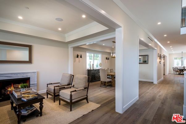 Dining room, Fireplace, Interior, Living room, Pendant Lights, Recessed Lighting, Wood Texture Flooring