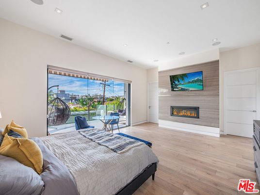 Bedroom, Fireplace, Interior, Recessed Lighting, Wood Texture Flooring