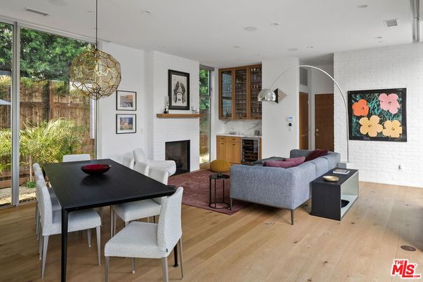 Dining room, Fireplace, Interior, Living room, Pendant Lights, Recessed Lighting, Wood Texture Flooring