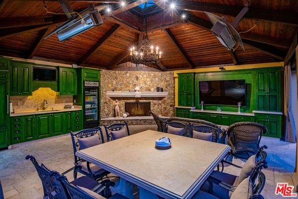 Chandelier, Dining room, Fireplace, Interior, Kitchen, Stone Walls, Wooden Beams, Wooden Ceilings