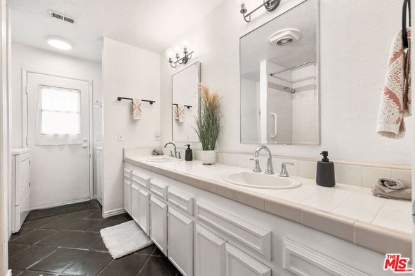 Bathroom, Dual Sink Vanities, Glass Shower, Interior, Recessed Lighting, Tile Countertops