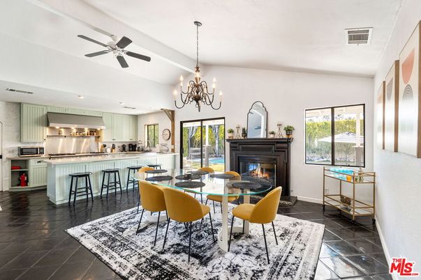Chandelier, Dining room, Fireplace, Interior, Kitchen, Recessed Lighting, Stainless Steel Appliances