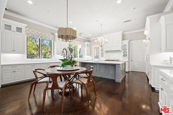 Chandelier, Dining room, Interior, Kitchen, Pendant Lights, Recessed Lighting, Stainless Steel Appliances, Wood Texture Flooring