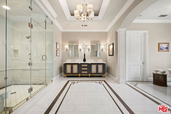 Bathroom, Chandelier, Dual Sink Vanities, Glass Shower, Interior, Marble Walls, Recessed Lighting
