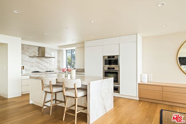 Interior, Kitchen, Marble Walls, Recessed Lighting, Stainless Steel Appliances, Wood Texture Flooring