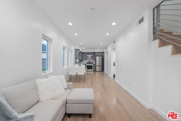 Dining room, Interior, Kitchen, Living room, Recessed Lighting, Stainless Steel Appliances, Wood Texture Flooring