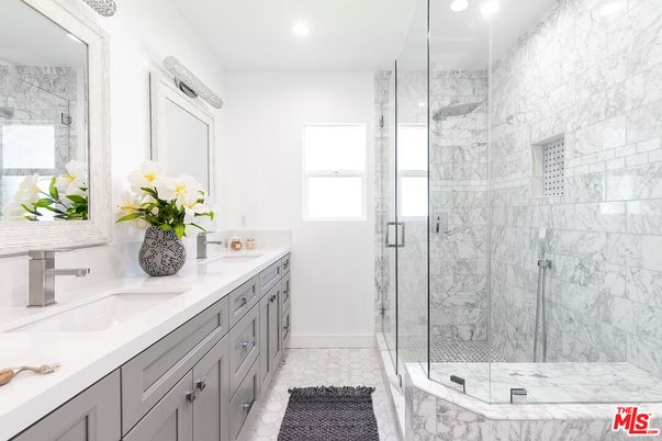 Bathroom, Dual Sink Vanities, Glass Shower, Interior, Marble, Marble Walls, Recessed Lighting