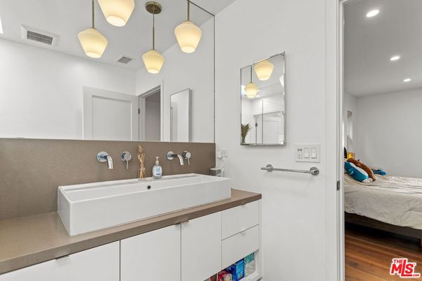 Bathroom, Bedroom, Dual Sink Vanities, Interior, Pendant Lights, Recessed Lighting, Wood Texture Flooring