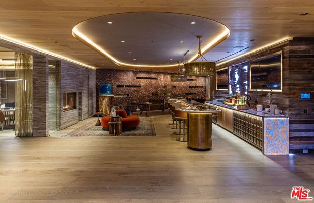 Chandelier, Dining room, Fireplace, Interior, Living room, Pendant Lights, Recessed Lighting, Stone Walls, Wine Storage, Wooden Ceilings, Wood Texture Flooring, Wooden Walls
