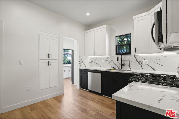 Interior, Kitchen, Marble Walls, Recessed Lighting, Wood Texture Flooring