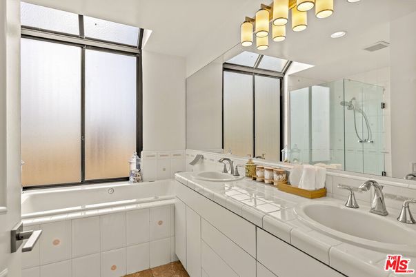 Bathroom, Dual Sink Vanities, Glass Shower, Interior, Recessed Lighting, Tile Countertops