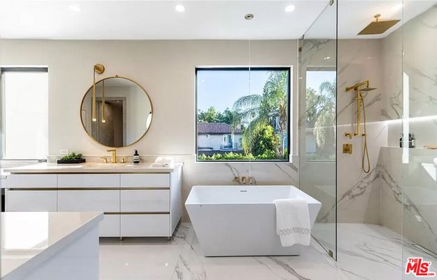 Bathroom, Dual Sink Vanities, Free Standing Baths, Glass Shower, Interior, Marble, Marble Walls, Recessed Lighting
