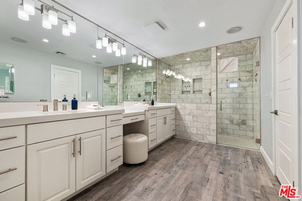 Bathroom, Dual Sink Vanities, Glass Shower, Interior, Recessed Lighting, Wood Texture Flooring
