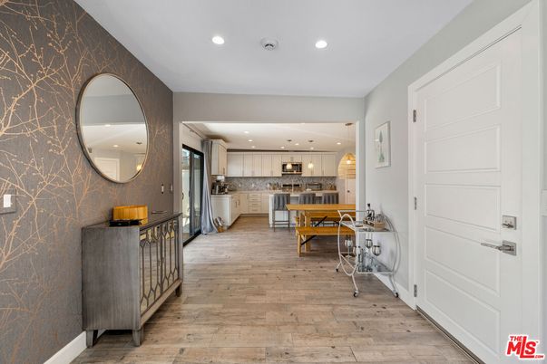 Dining room, Interior, Kitchen, Pendant Lights, Recessed Lighting, Stainless Steel Appliances, Wood Texture Flooring
