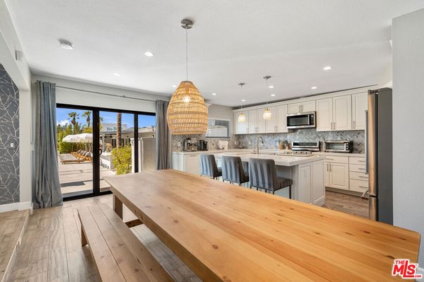Dining room, Interior, Kitchen, Pendant Lights, Recessed Lighting, Stainless Steel Appliances, Wood Texture Flooring