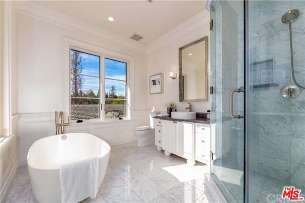 Bathroom, Dual Sink Vanities, Free Standing Baths, Glass Shower, Interior, Marble, Marble Walls, Recessed Lighting