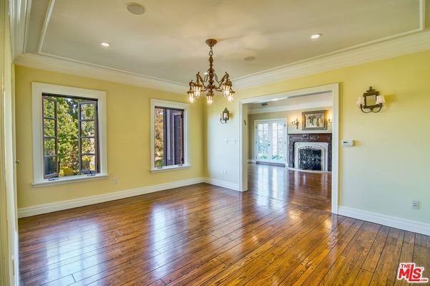 Chandelier, Empty room, Fireplace, Interior, Recessed Lighting, Wood Texture Flooring