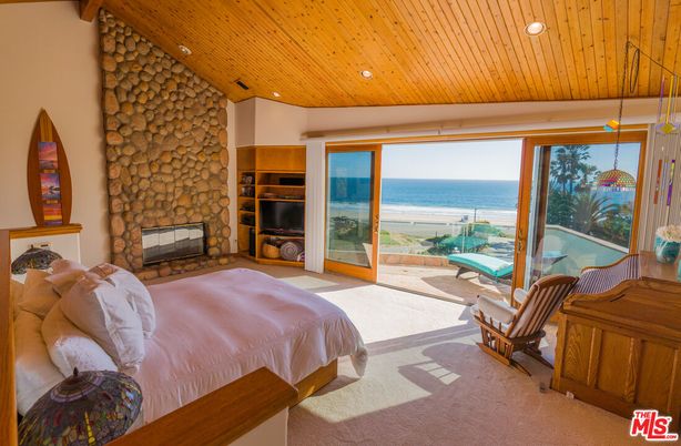Bedroom, Fireplace, Interior, Recessed Lighting, Stone Walls, Water, Wooden Ceilings