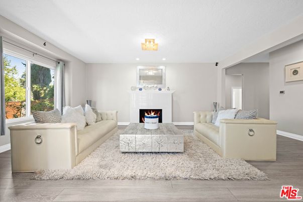 Fireplace, Interior, Living room, Recessed Lighting, Wood Texture Flooring
