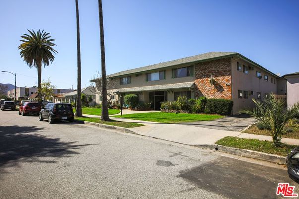 Exterior, Facade, Brick Facade, Condo Building