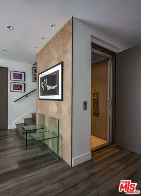 Elevator, Interior, Recessed Lighting, Wood Texture Flooring, Wooden Walls