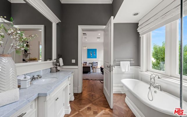 Bathroom, Dual Sink Vanities, Free Standing Baths, Interior, Pendant Lights, Recessed Lighting, Wood Texture Flooring