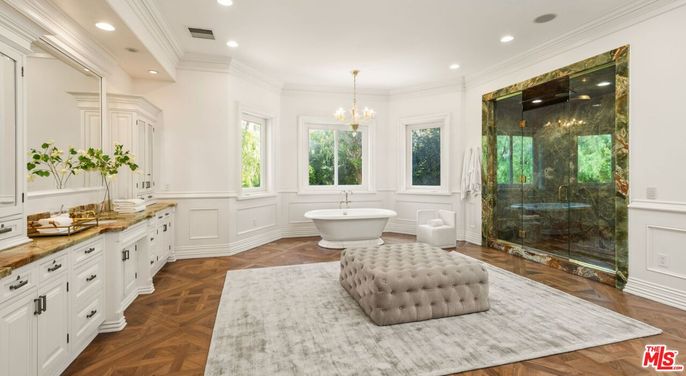 Bathroom, Chandelier, Dual Sink Vanities, Free Standing Baths, Glass Shower, Interior, Pendant Lights, Recessed Lighting, Wood Texture Flooring