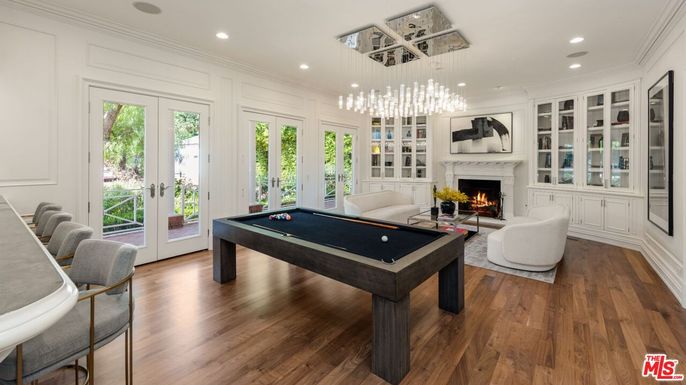 Billiard Table, Fireplace, Game Room, Interior, Pendant Lights, Recessed Lighting, Wood Texture Flooring