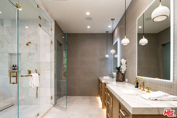 Bathroom, Dual Sink Vanities, Glass Shower, Interior, Marble, Marble Walls, Pendant Lights, Recessed Lighting