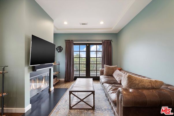 Fireplace, Interior, Living room, Recessed Lighting, Wood Texture Flooring