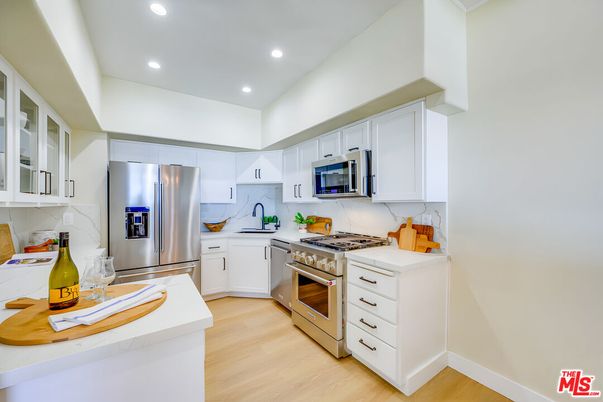 Interior, Kitchen, Recessed Lighting, Stainless Steel Appliances, Wood Texture Flooring