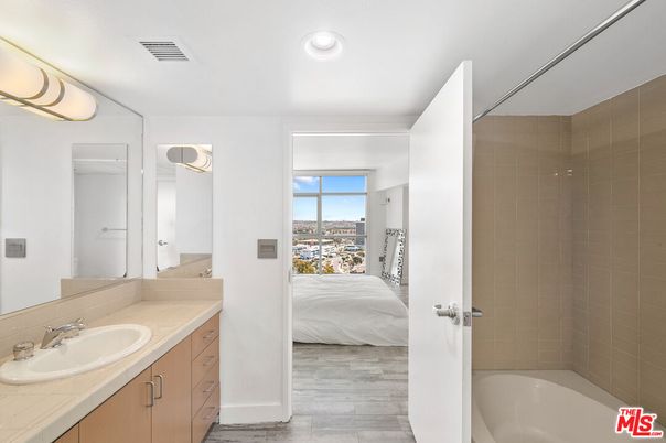 Bathroom, Bedroom, Interior, Recessed Lighting, Tile Countertops, Wood Texture Flooring