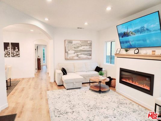 Fireplace, Interior, Living room, Recessed Lighting, Wood Texture Flooring
