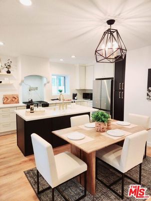 Dining room, Interior, Kitchen, Pendant Lights, Recessed Lighting, Stainless Steel Appliances, Wood Texture Flooring