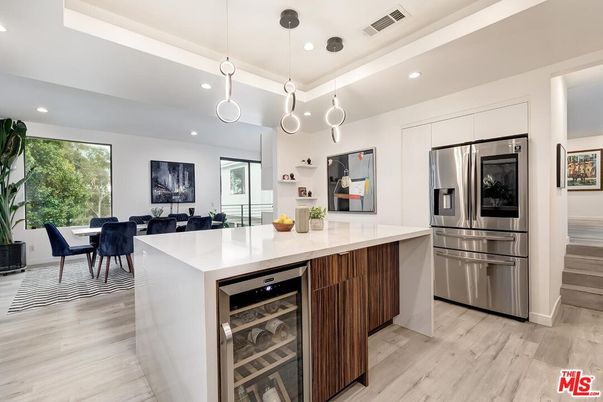 Dining room, Interior, Kitchen, Pendant Lights, Recessed Lighting, Stainless Steel Appliances, Wood Texture Flooring