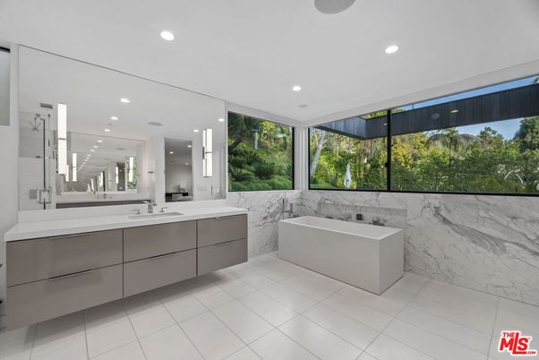 Bathroom, Dual Sink Vanities, Free Standing Baths, Interior, Marble Walls, Recessed Lighting