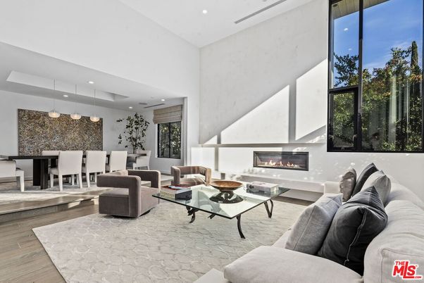 Dining room, Fireplace, Interior, Living room, Pendant Lights, Recessed Lighting, Wood Texture Flooring