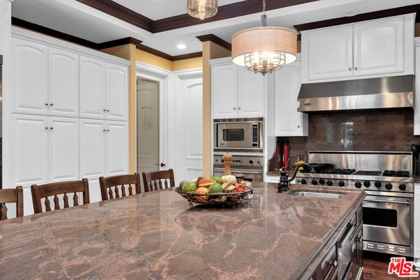 Chandelier, Interior, Kitchen, Pendant Lights, Recessed Lighting, Stainless Steel Appliances, Wooden Beams, Wood Texture Flooring