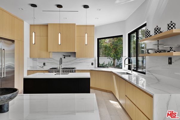 Interior, Kitchen, Marble Walls, Pendant Lights, Recessed Lighting, Stainless Steel Appliances