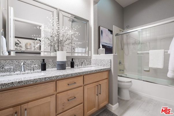 Bathroom, Dual Sink Vanities, Glass Shower, Interior, Wood Texture Flooring