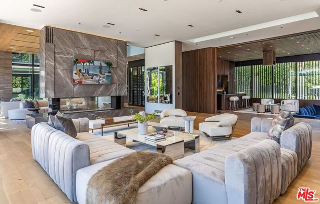 Fireplace, Interior, Living room, Marble Walls, Recessed Lighting, Wood Texture Flooring